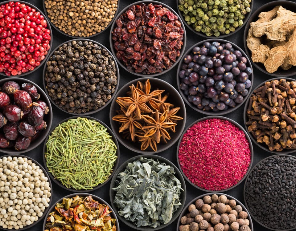 Fresh spices and herbs for food. Colorful condiments as background, top view. lot seasonings in cups, on table